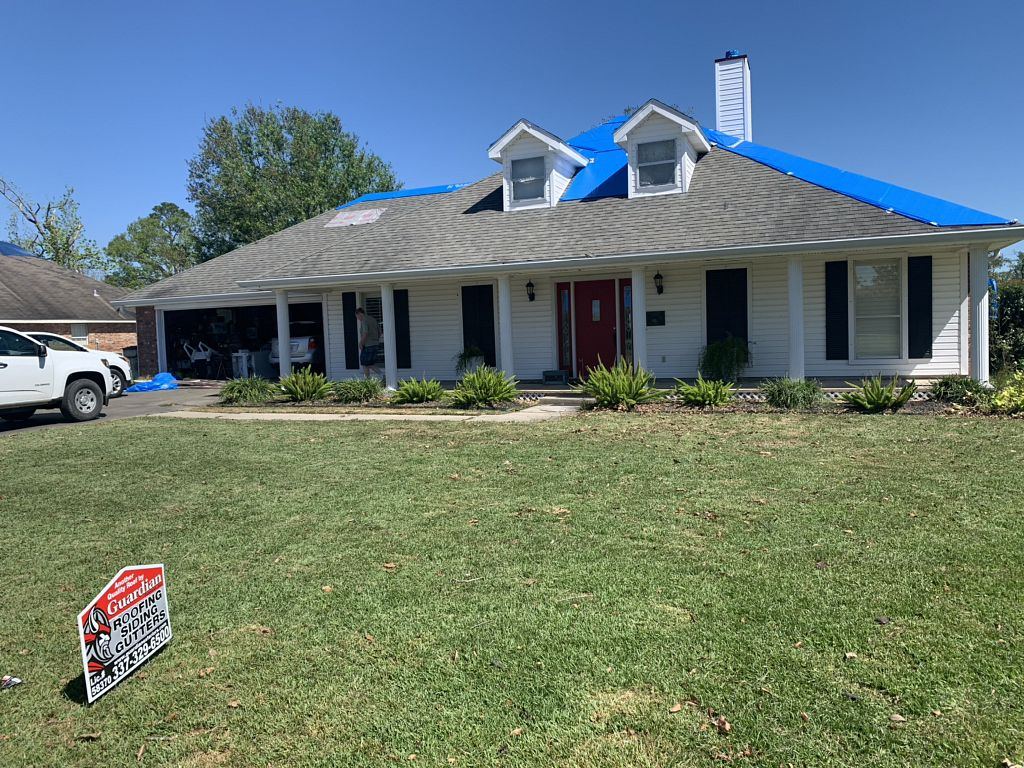 Full reroof after storm damage before
